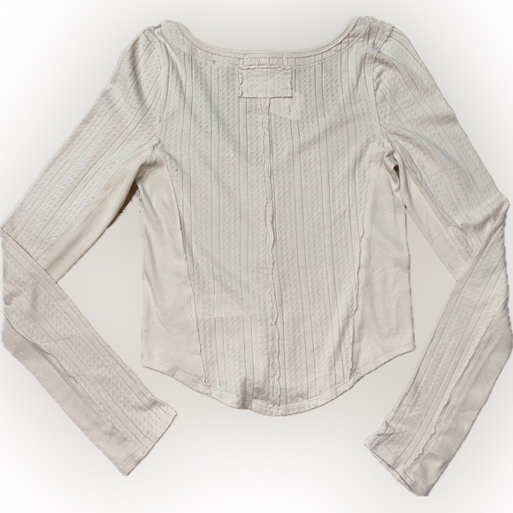 NWT Free People SZ L v-neck long sleeve top w/curved hemline, beige/bust 36”-44” - Picture 2 of 3